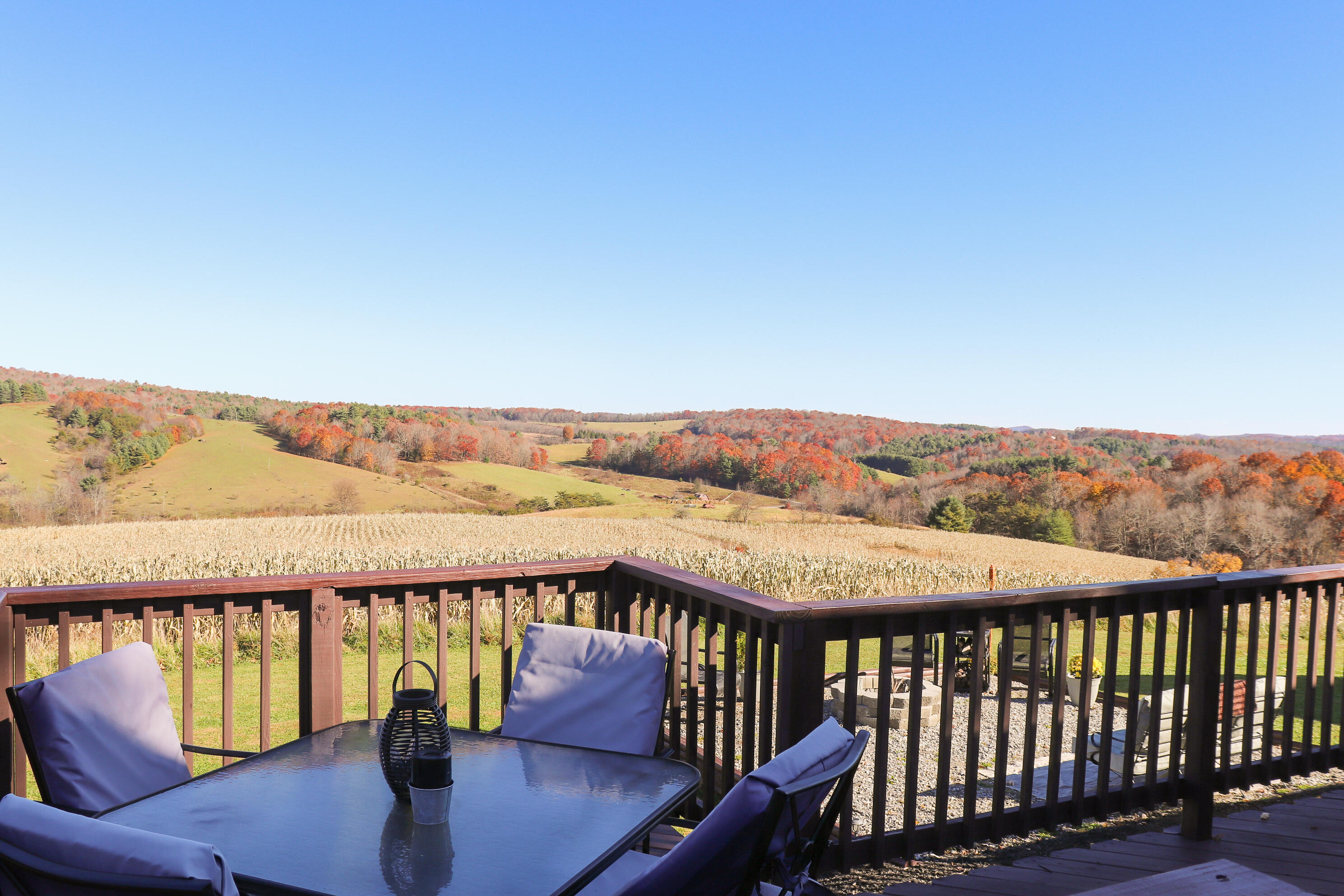 2663 Bethlehem Church Road Northeast Pilot, VA 24138 - Photo 22 of 24 a view of a balcony with wooden floor and outdoor seating