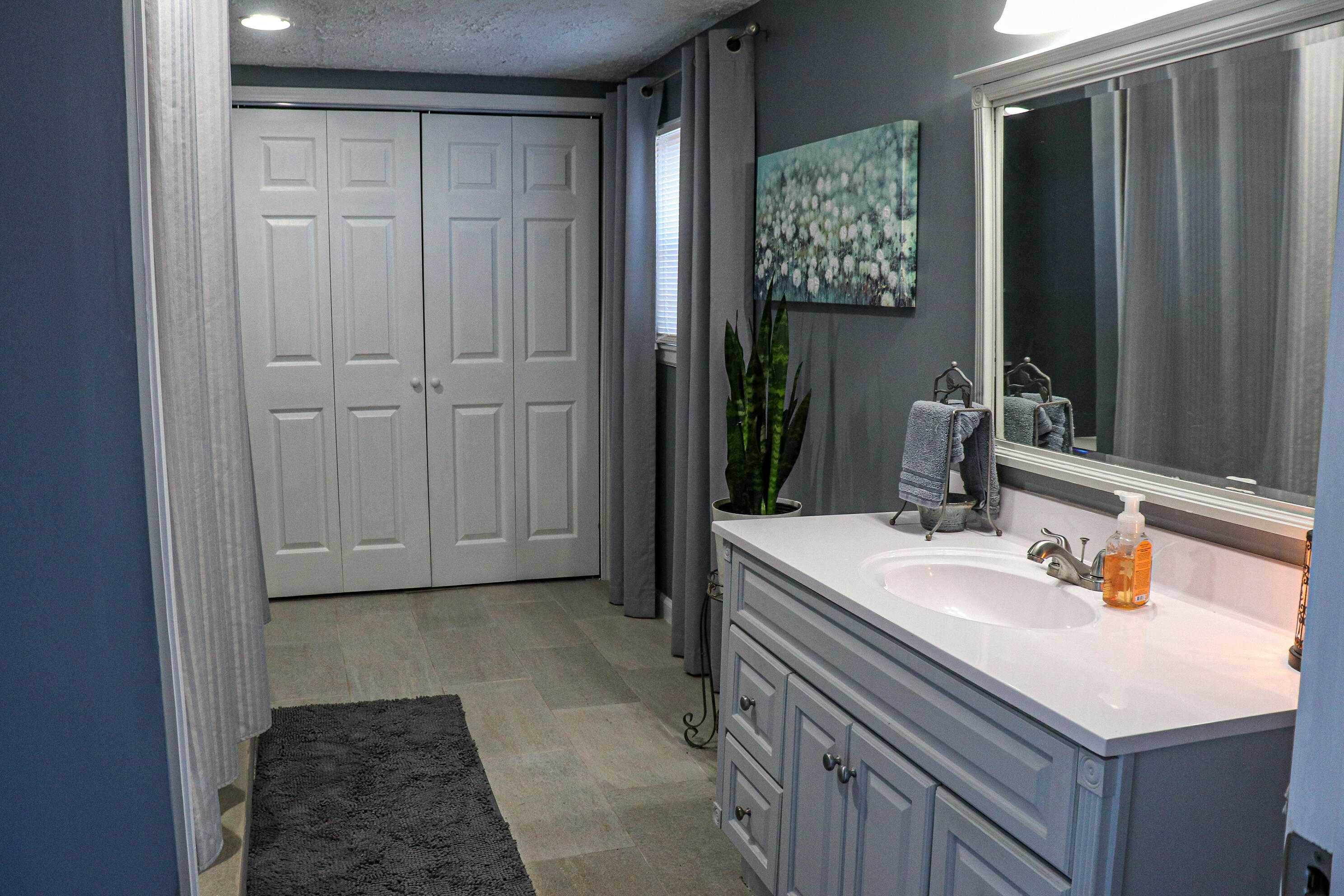 2663 Bethlehem Church Road Northeast Pilot, VA 24138 - Photo 8 of 24 a bathroom with a sink and a mirror