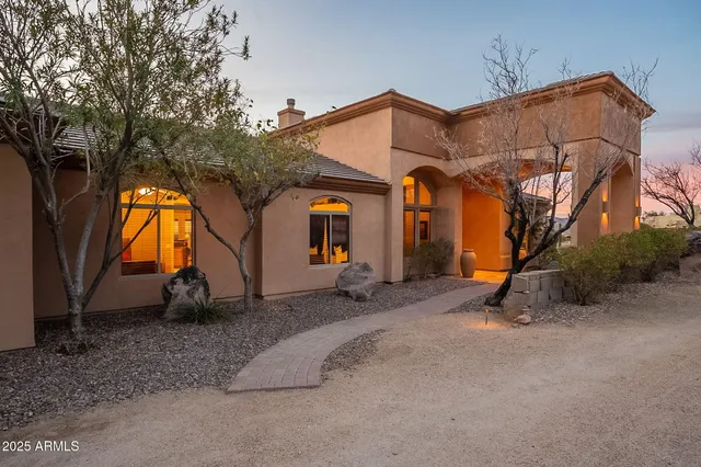 a view of entrance gate of a house