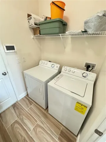 a utility room with dryer and washer