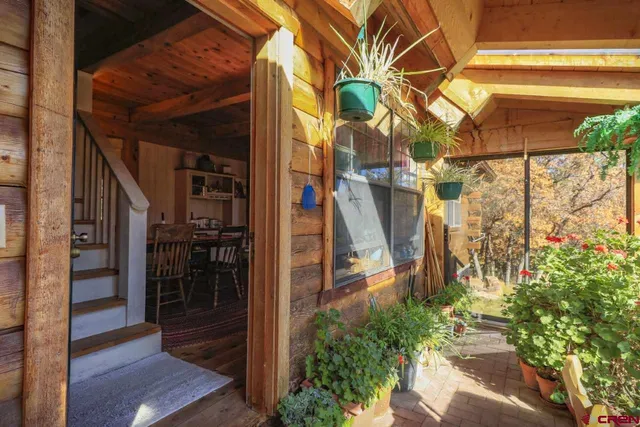 a view of a house in a forest