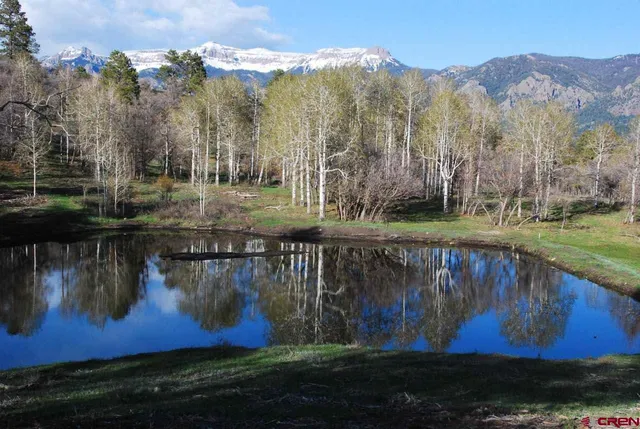 a view of a lake with a mountain in the background