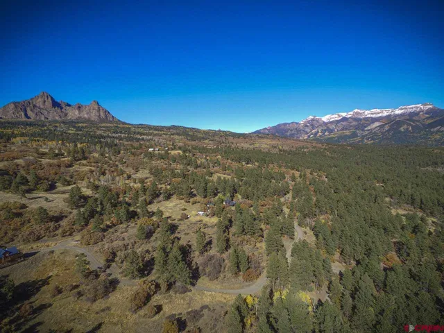 a view of a lake with mountains in the background