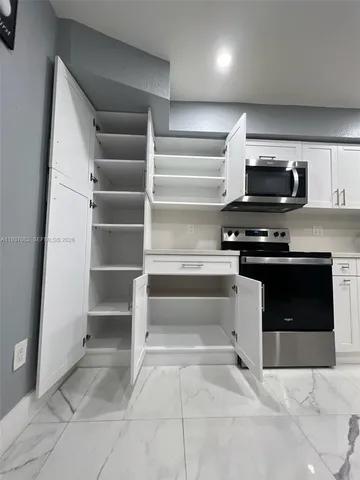 a view of tall house with outdoor space