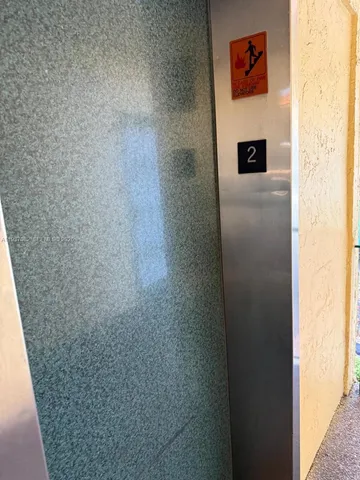 a view of a street with cars