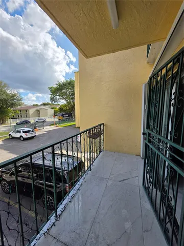 a view of a hallway and a workspace