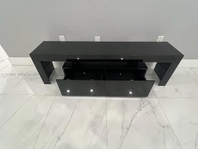 a large kitchen with cabinets