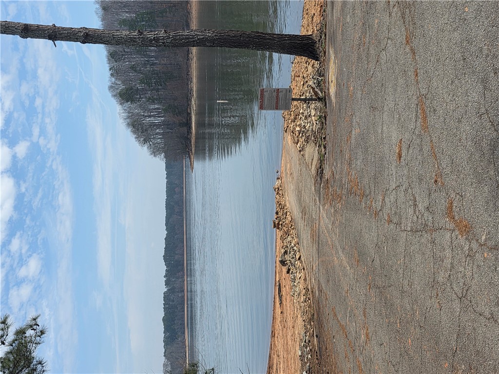 Lot 29-30 Timberlake One Circle Seneca, SC 29678 - Photo 3 of 4 This serene waterfront lot offers direct access to the lake, surrounded by natural beauty.