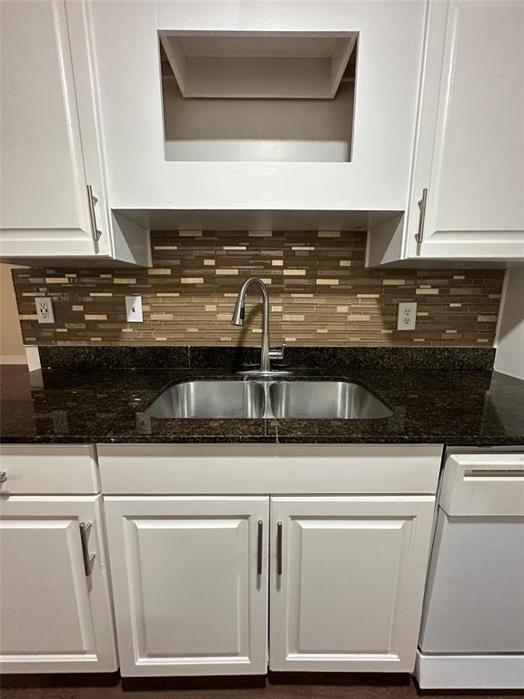 1609 Running River Road Garland, TX 75044 - Photo 16 of 37 a close view of a stove top oven and sink