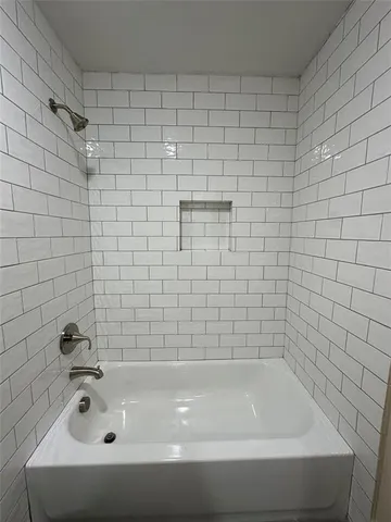 a bathroom with a bathtub