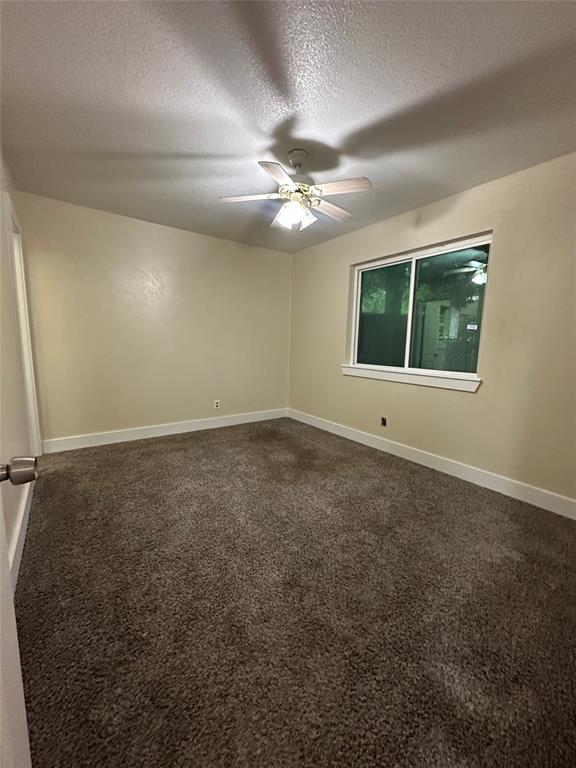 1609 Running River Road Garland, TX 75044 - Photo 31 of 37 a view of an empty room with a window