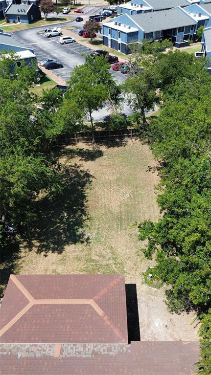 1609 Running River Road Garland, TX 75044 - Photo 36 of 37 a view of a yard with plants