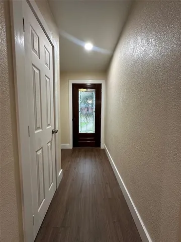 wooden floor in a hall with wooden floor