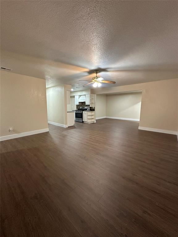 1609 Running River Road Garland, TX 75044 - Photo 8 of 37 a view of a room with an empty space