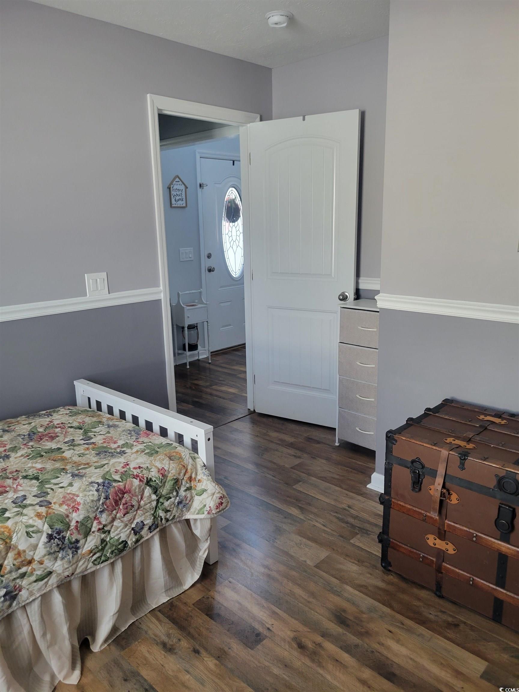 405 Beulah Circle Conway, SC 29527 - Photo 17 of 28 Bedroom with dark wood finished floors