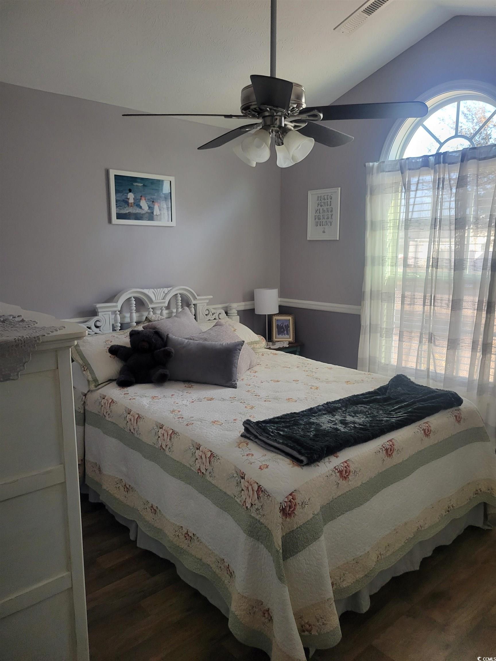 405 Beulah Circle Conway, SC 29527 - Photo 19 of 28 Bedroom with vaulted ceiling, dark wood-type flooring, and a ceiling fan