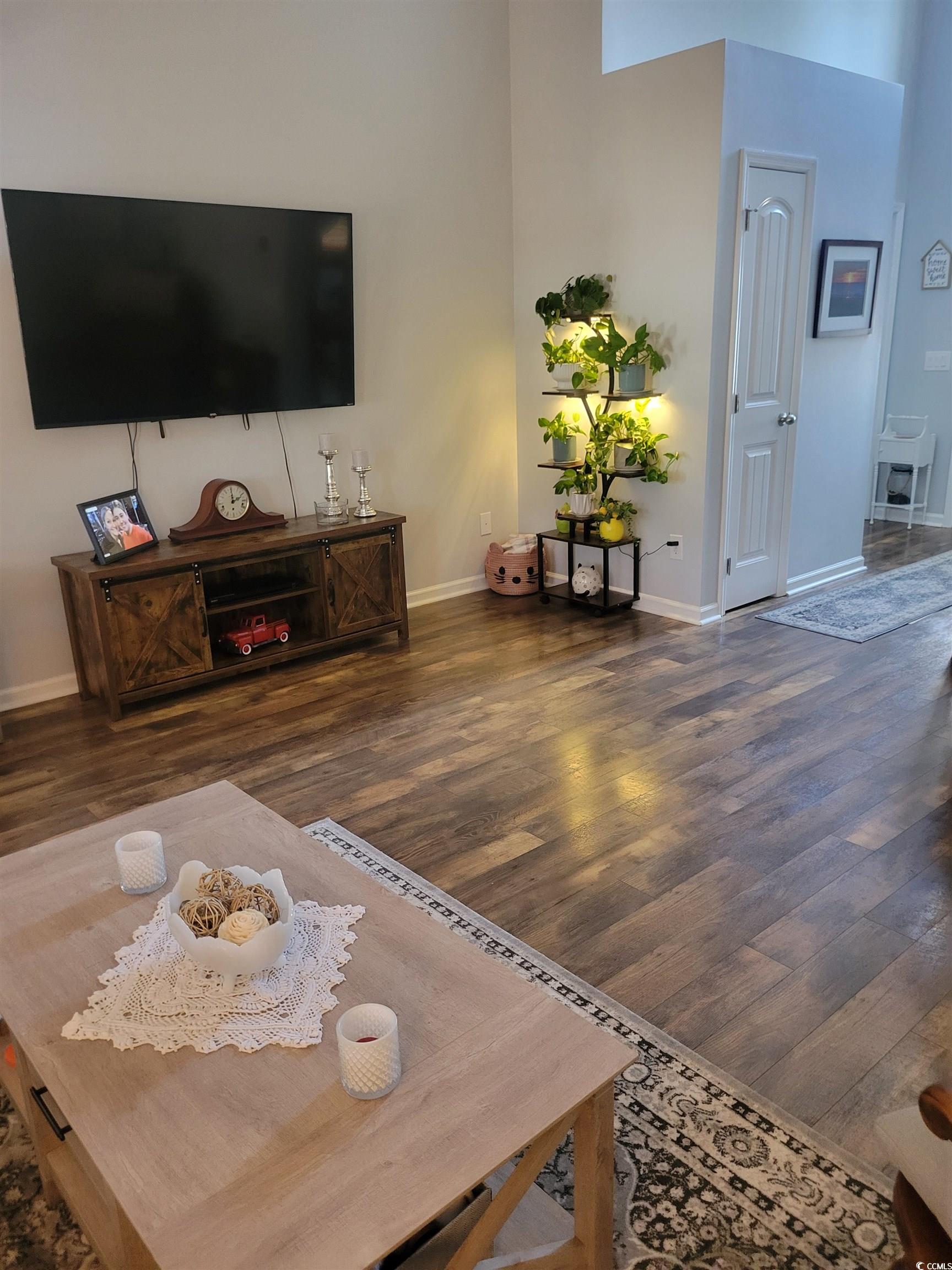 405 Beulah Circle Conway, SC 29527 - Photo 5 of 28 Living area featuring dark wood finished floors