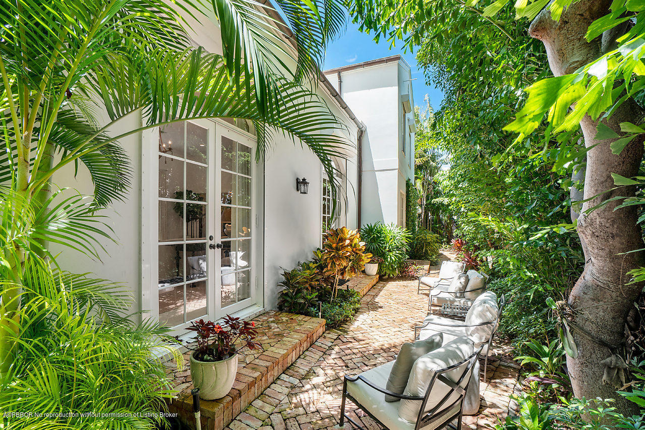 165 Root Trail Palm Beach, FL 33480 - Photo 28 of 39 a house with a outdoor space