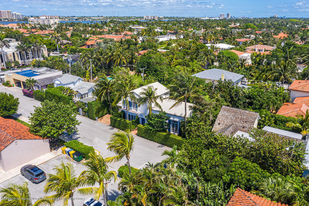165 Root Trail Palm Beach, FL 33480 - Photo 36 of 39 an aerial view of residential houses with outdoor space and trees