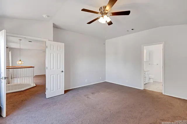 a view of an empty walk in closet