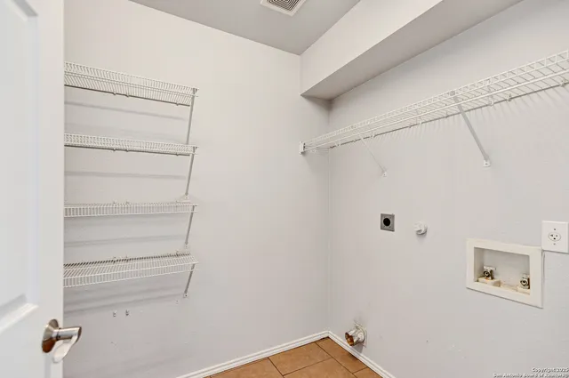 a view of a room with racks on the wall