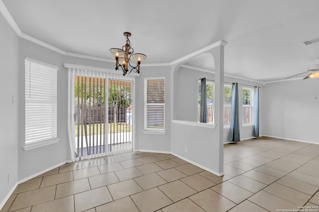 a view of a room with windows