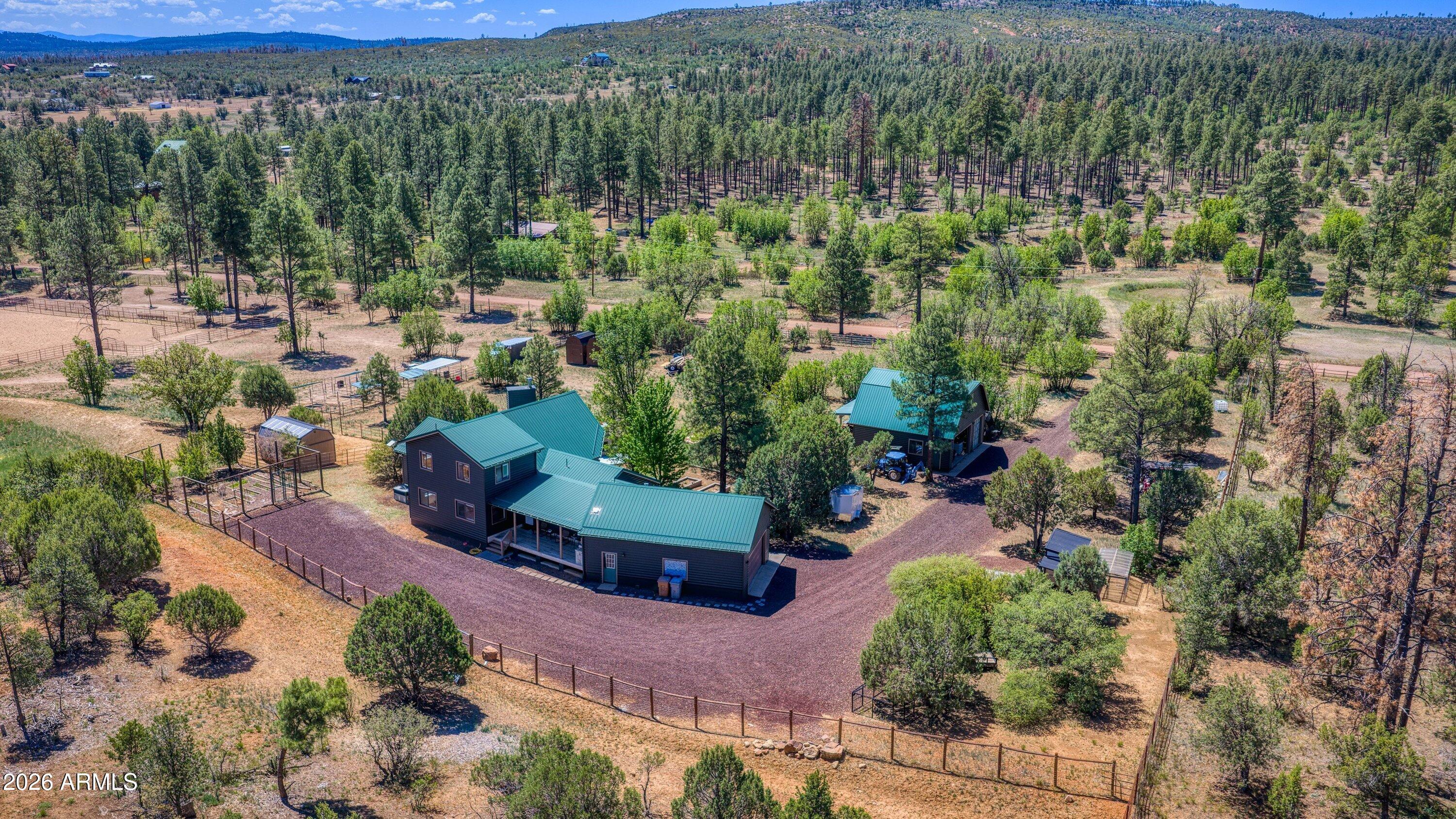 5182 Pinedale Wash Road Pinedale, AZ 85934 - Photo 39 of 54 an aerial view of a house with a yard