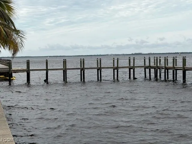 a view of swimming pool with furniture