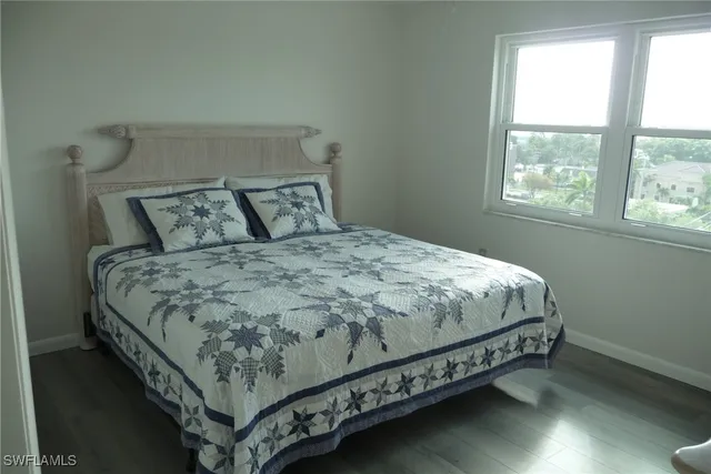 a room with furniture and flat screen tv