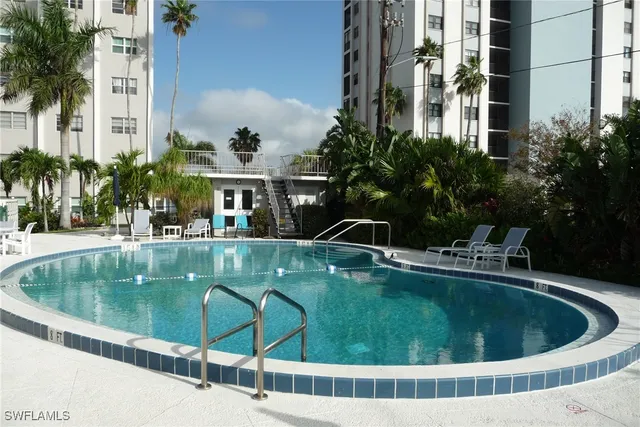 a view of a house with swimming pool