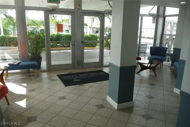 a view of kitchen with furniture and large window