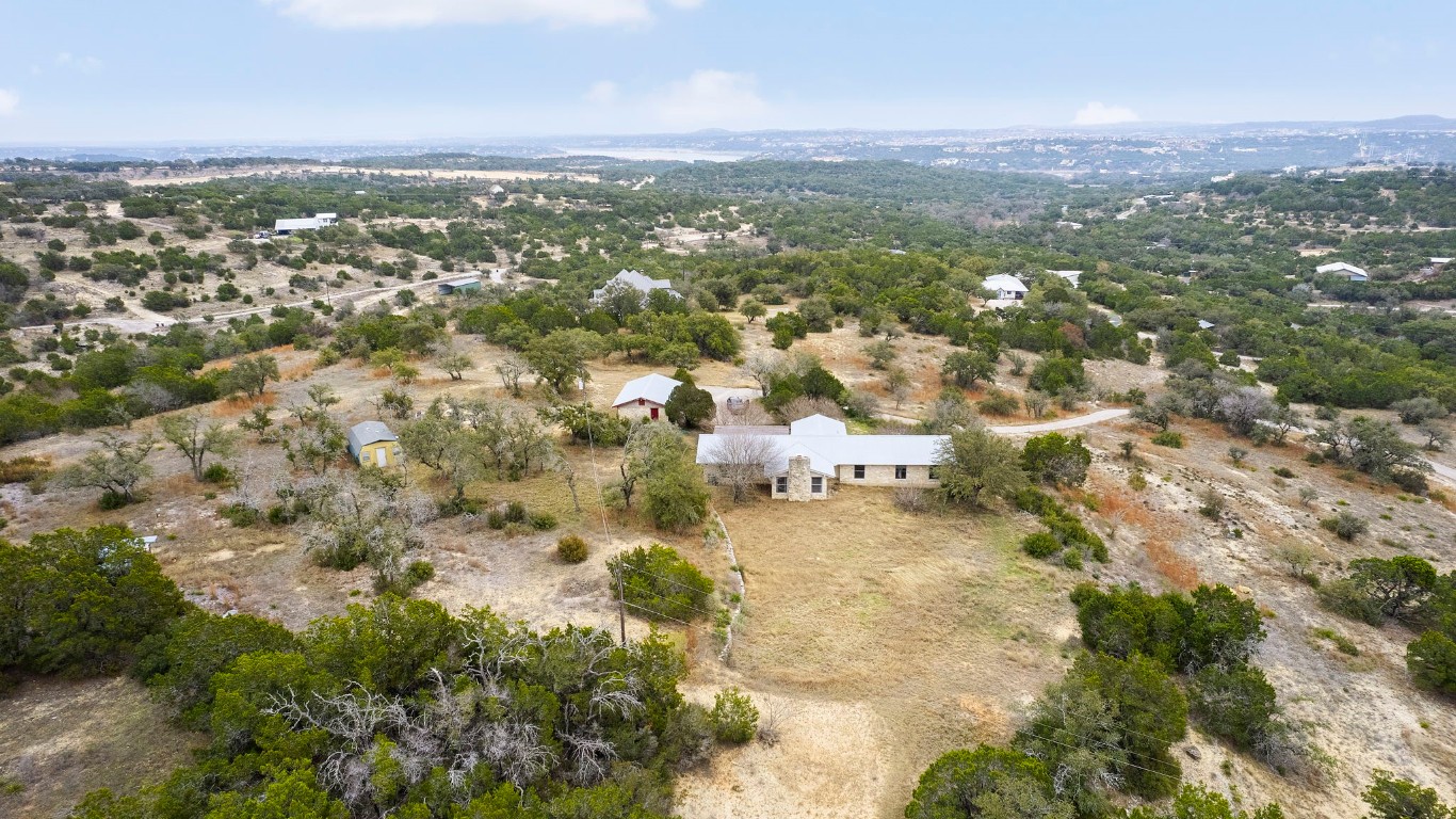 21406 Kathy Lane Spicewood, TX 78669 - Photo 23 of 40 an aerial view of residential building with parking space