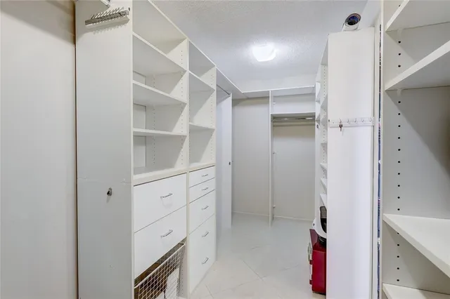 a view of an empty walk in closet