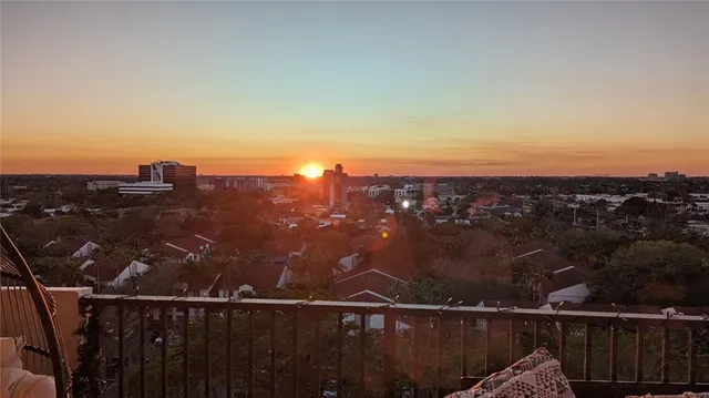 a view of city and a balcony