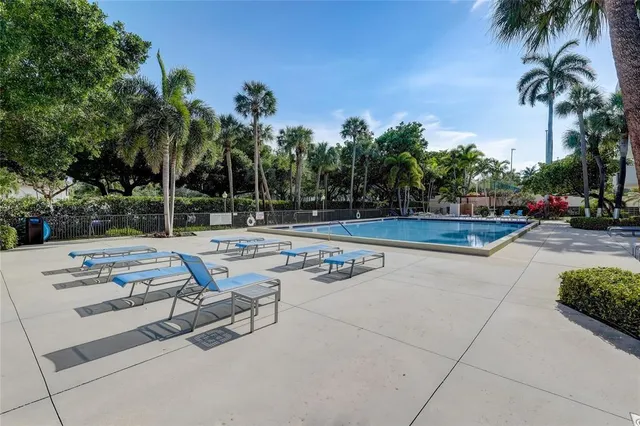 a view of a patio with swimming pool