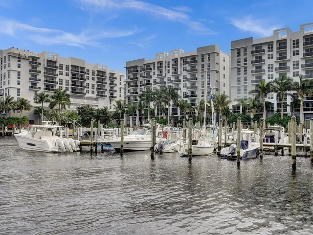 a view of tall buildings and a lake view