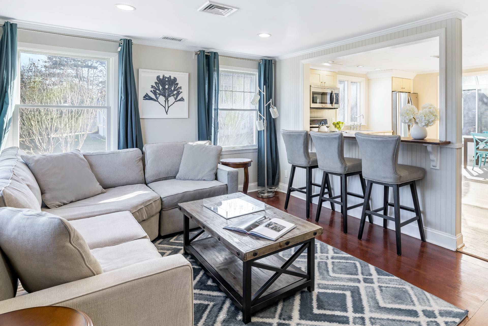 63 2nd House Road Montauk, NY 11954 - Photo 4 of 14 a living room with furniture and wooden floor
