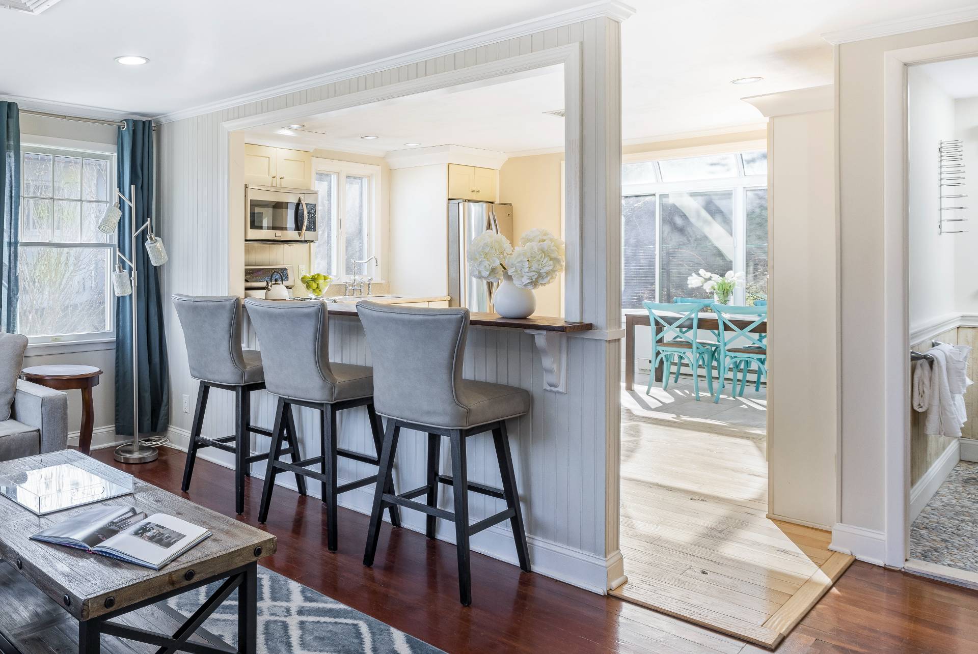 63 2nd House Road Montauk, NY 11954 - Photo 6 of 14 a dining room with furniture and wooden floor