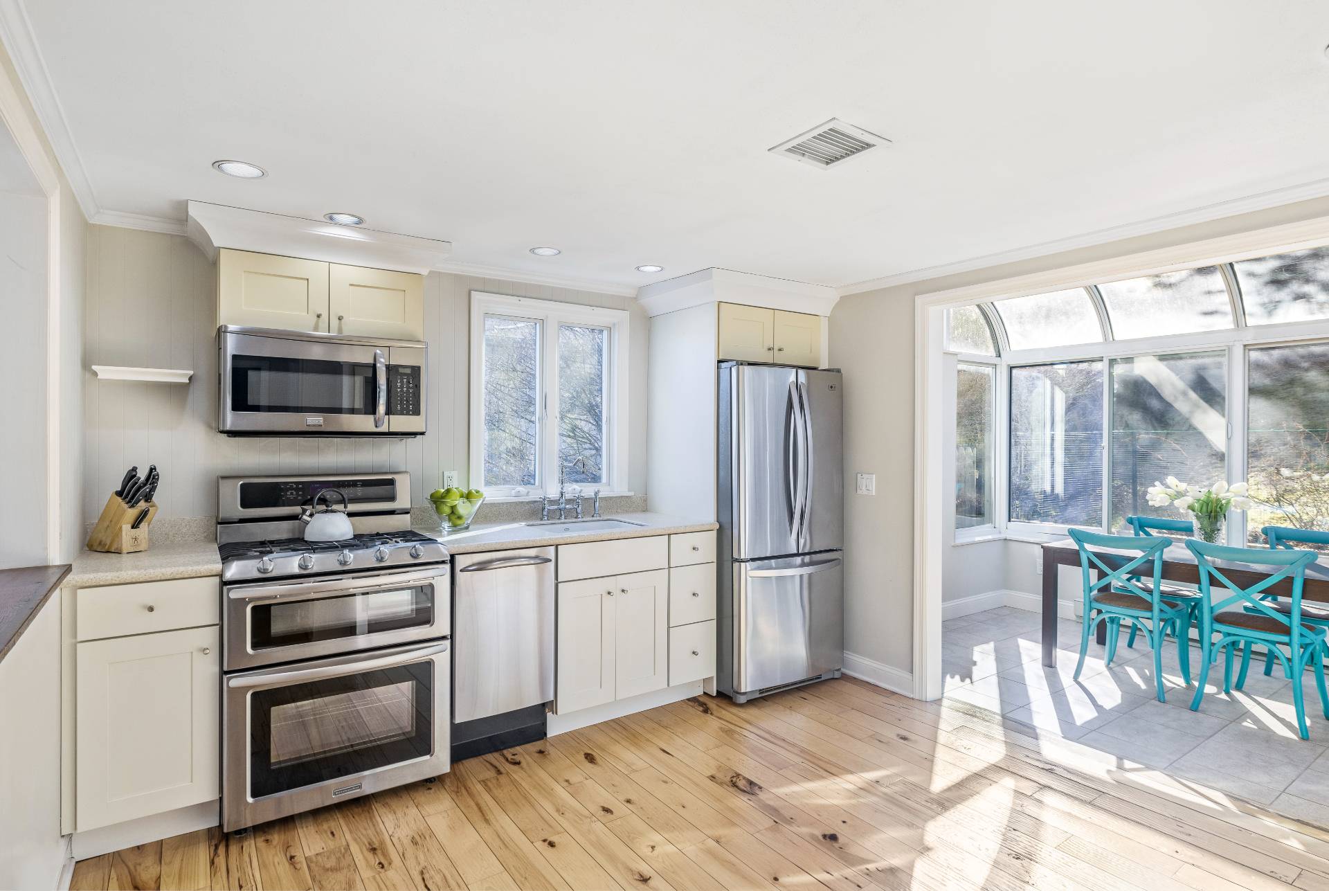 63 2nd House Road Montauk, NY 11954 - Photo 7 of 14 a kitchen with stainless steel appliances granite countertop a refrigerator stove and sink