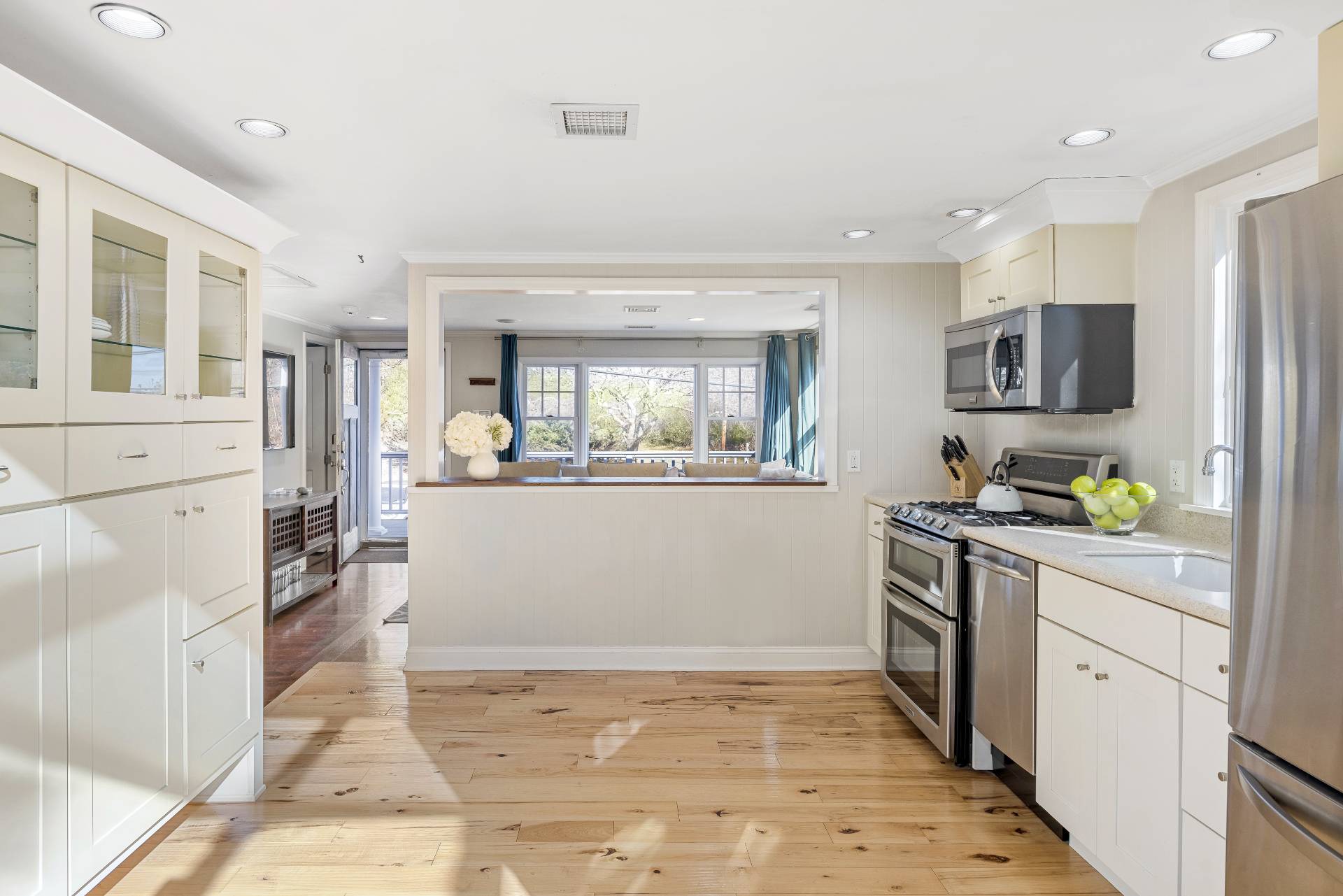 63 2nd House Road Montauk, NY 11954 - Photo 8 of 14 a kitchen with granite countertop a refrigerator stove top oven and sink