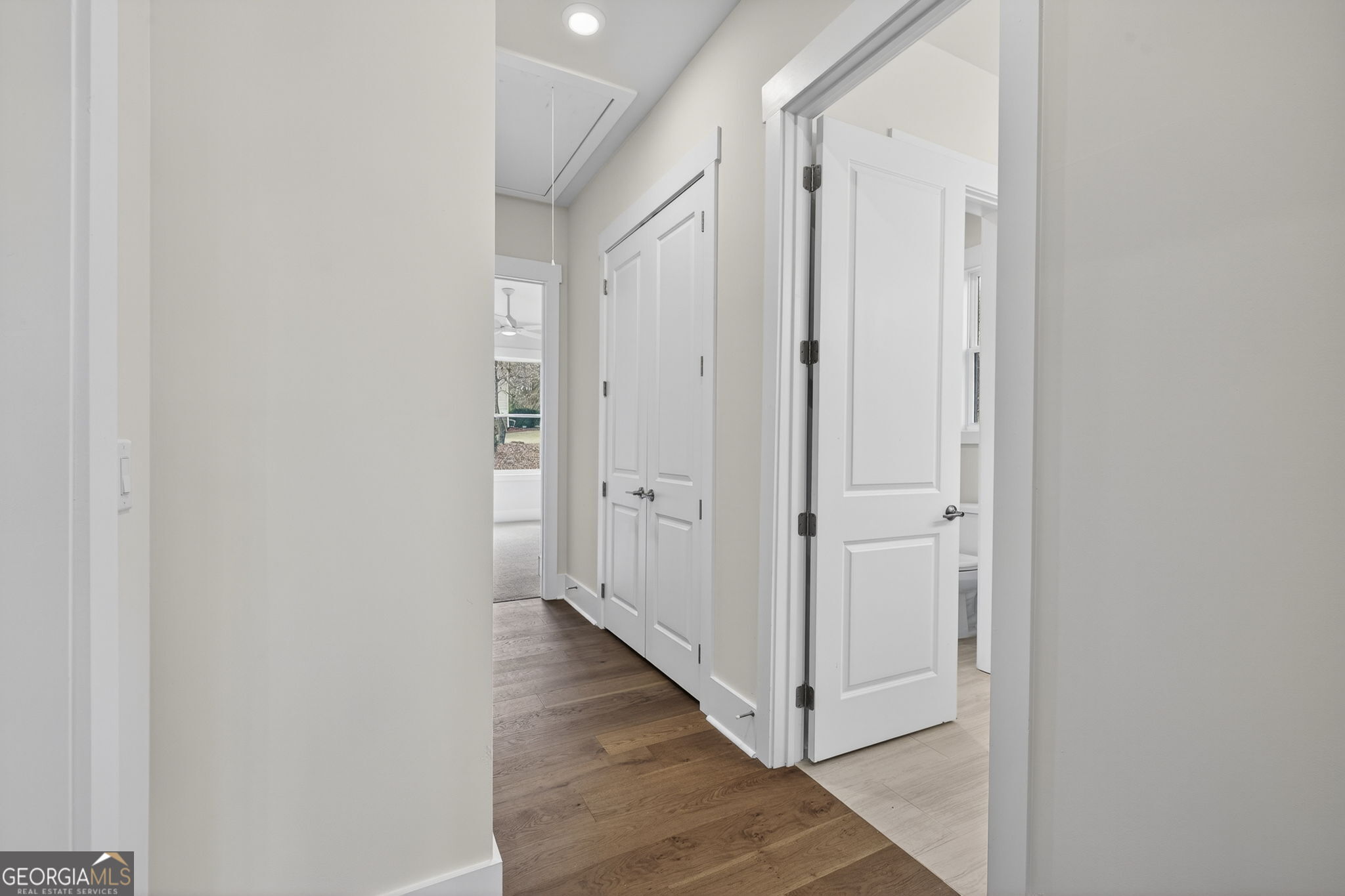 1020 Oak Valley Road Greensboro, GA 30642 - Photo 18 of 64 a view of a hallway with wooden floor
