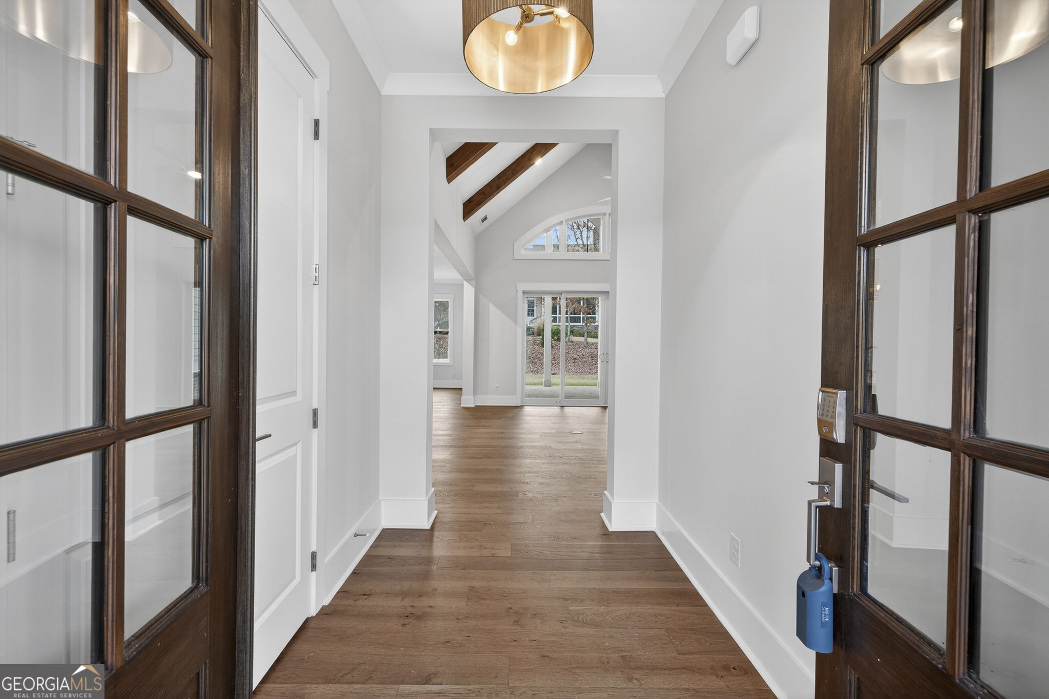 1020 Oak Valley Road Greensboro, GA 30642 - Photo 4 of 64 a view of a hallway with wooden floor and entryway