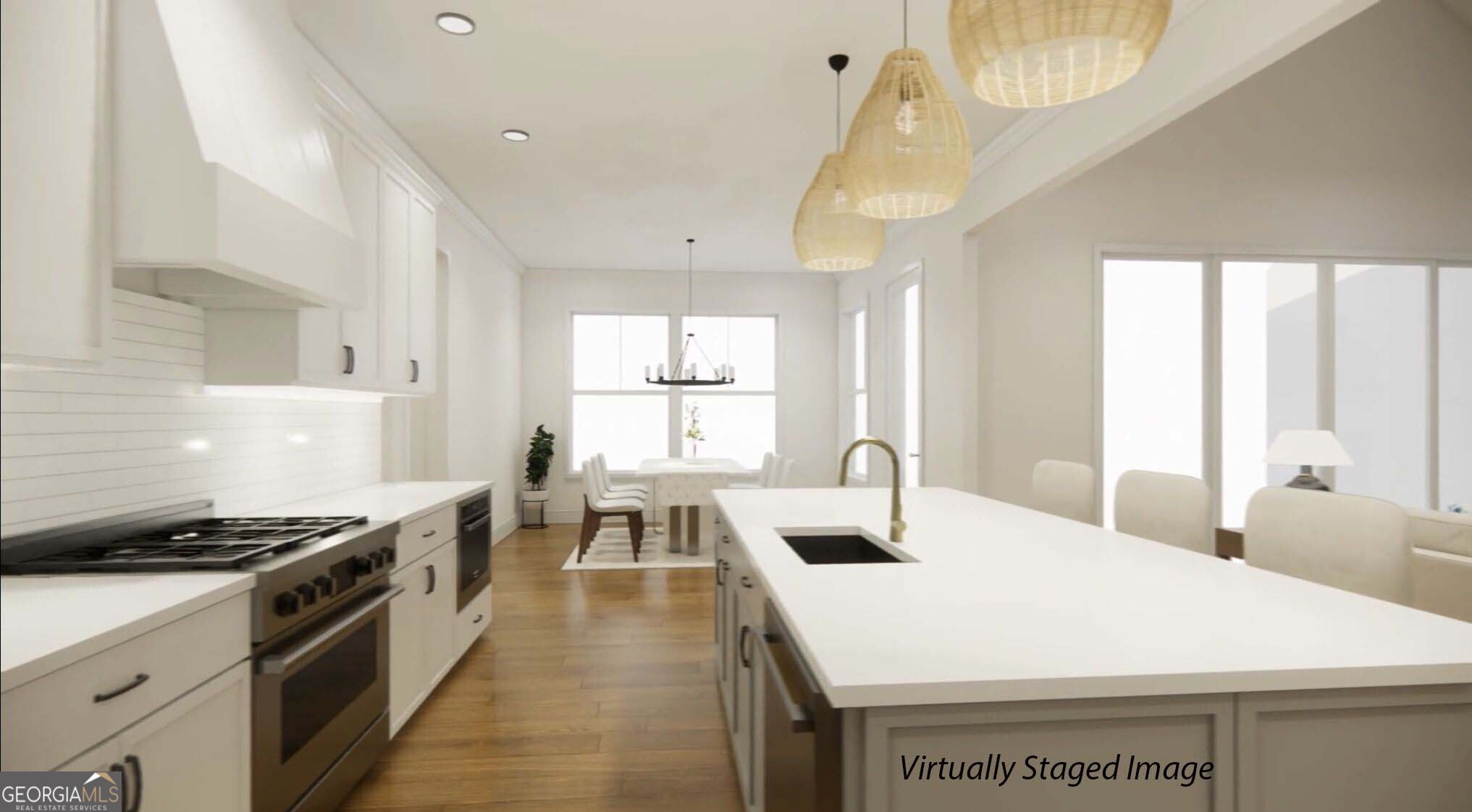 1020 Oak Valley Road Greensboro, GA 30642 - Photo 5 of 64 a kitchen with a stove a sink a dining table and chairs