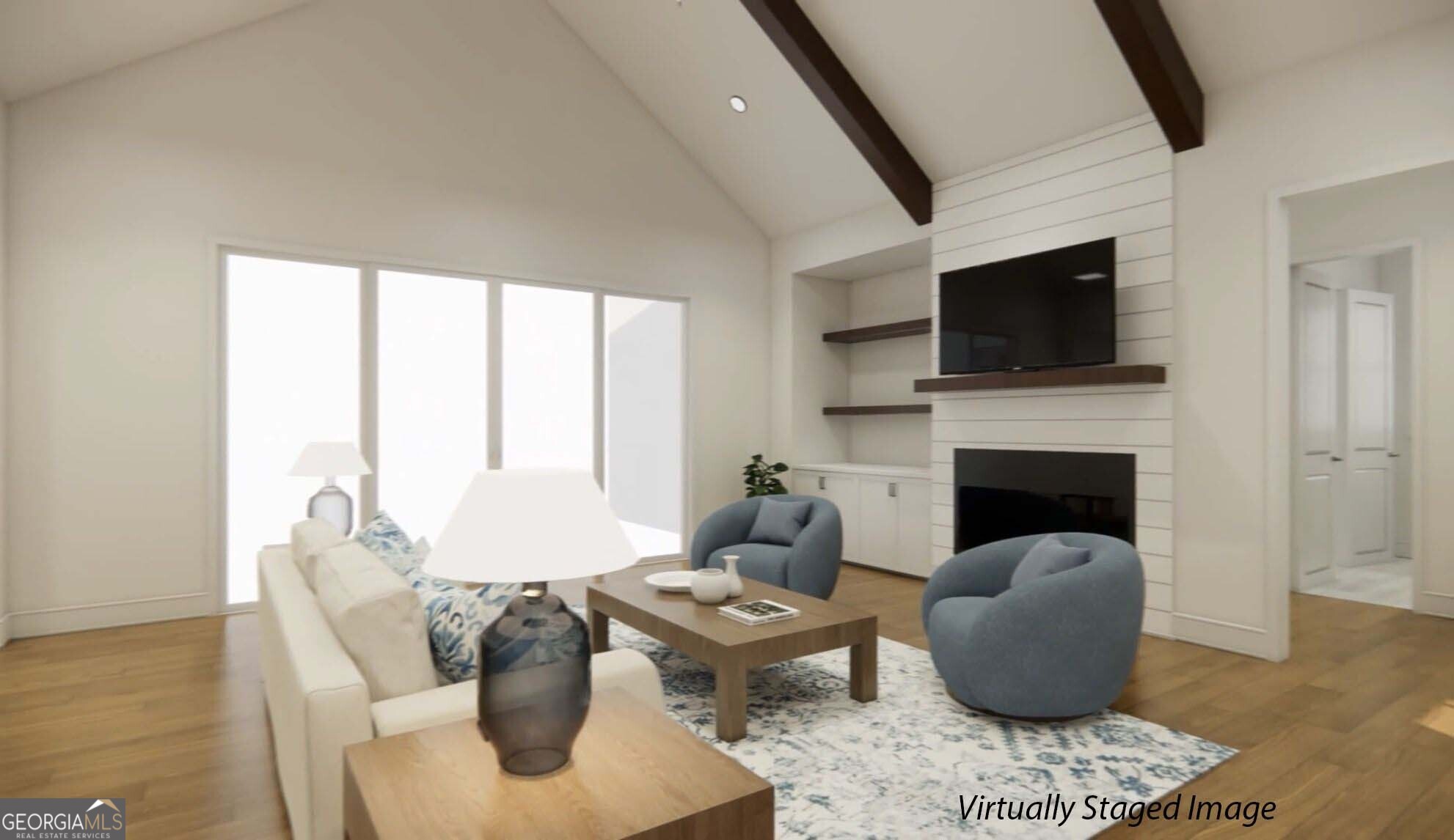 1020 Oak Valley Road Greensboro, GA 30642 - Photo 6 of 64 a living room with furniture a fireplace and a flat screen tv