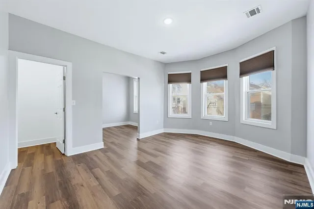 a view of livingroom with hardwood floor and window