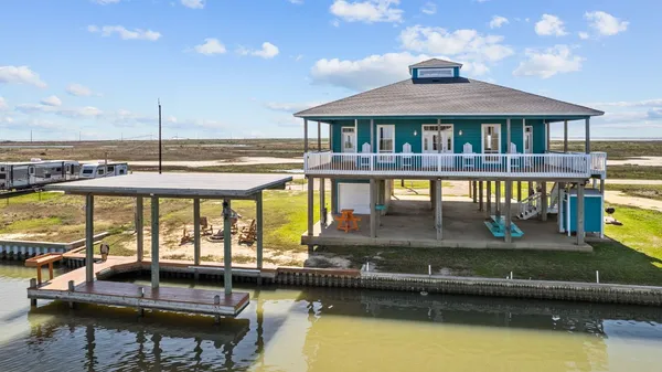 a view of a swimming pool with a deck