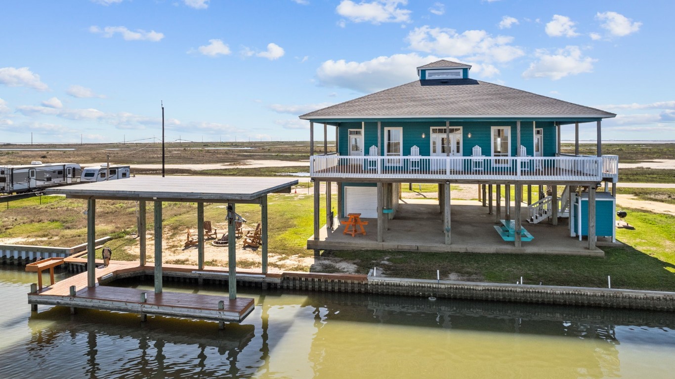 a view of a swimming pool with a deck