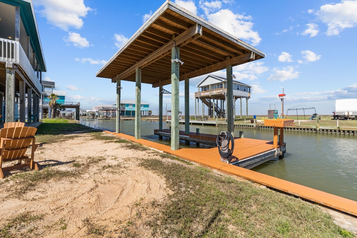 522 Dolphin Drive Freeport, TX 77541 - Photo 12 of 47 a outdoor view with a sitting space
