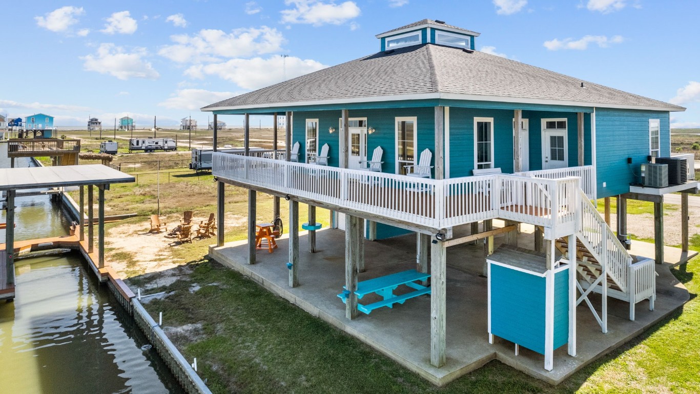 522 Dolphin Drive Freeport, TX 77541 - Photo 2 of 47 a view of a house with pool