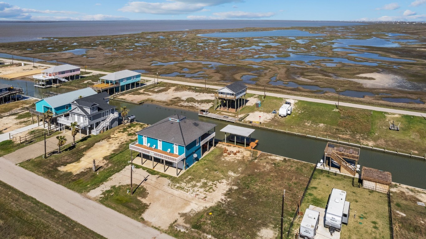 522 Dolphin Drive Freeport, TX 77541 - Photo 43 of 47 a view of a city with an ocean